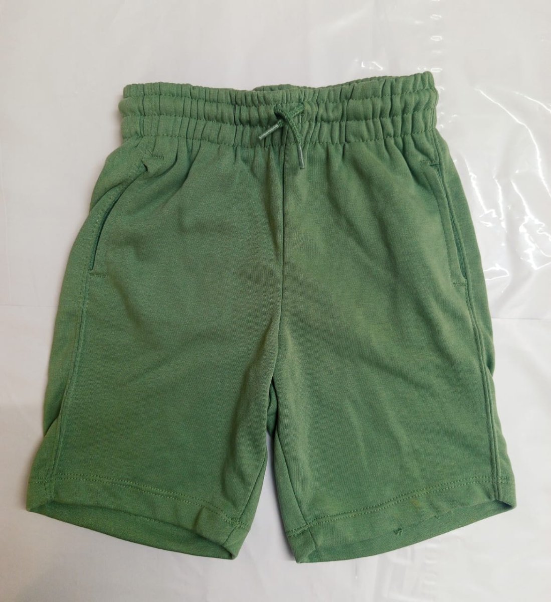 greenish shorts
